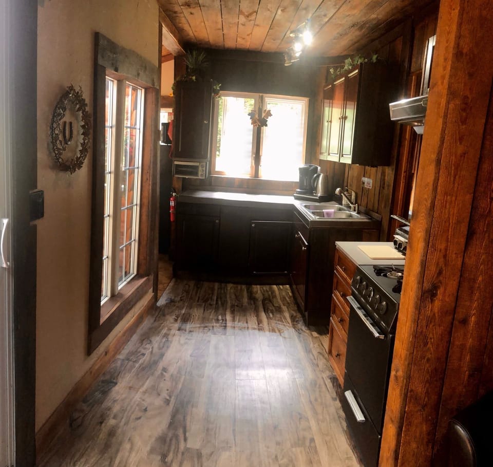 Fully Stocked Kitchen.
The Fridge is around the corner in the breakfast nook
