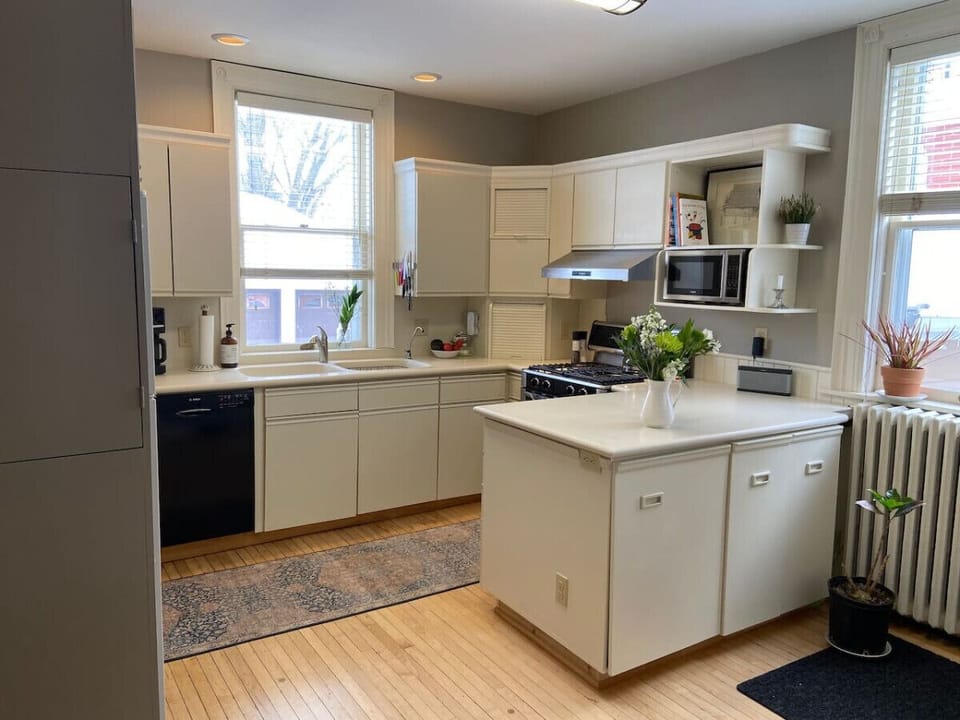 Fully equipped kitchen with gas range and oven.