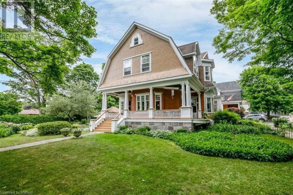 Beautiful perennial gardens surround the home.