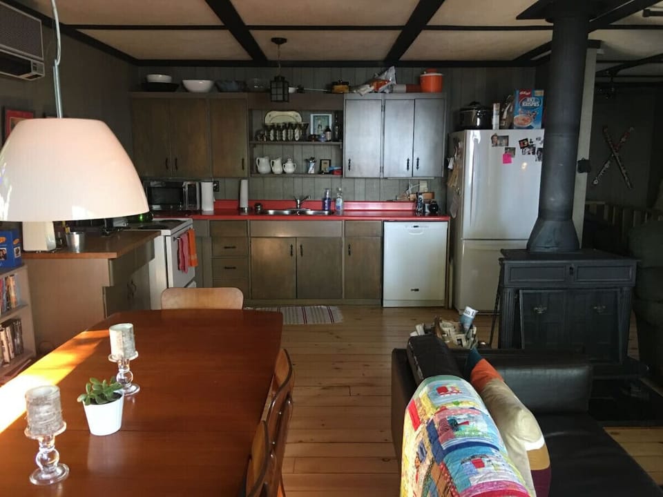 Open concept dining, kitchen and lounge.