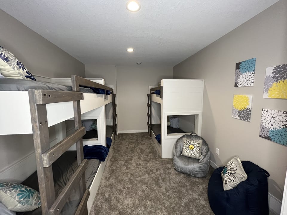 Bunk room attached to king bedroom in basement. 6 twin beds. 