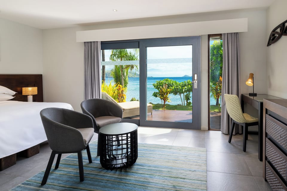 Room, 1 King Bed, Oceanfront | Premium bedding, in-room safe, individually furnished, desk