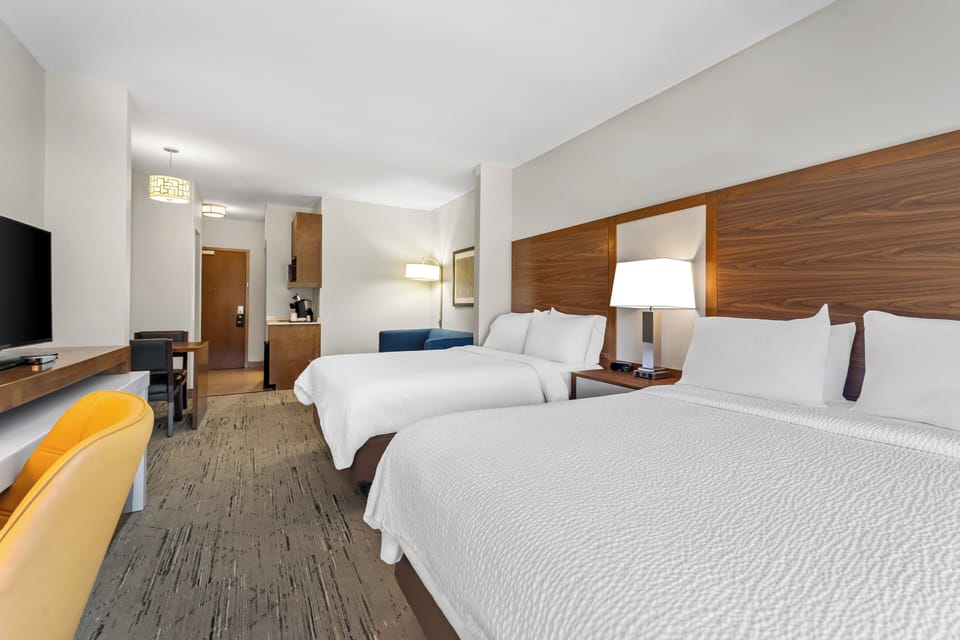 Suite, Non Smoking | In-room safe, desk, iron/ironing board, rollaway beds