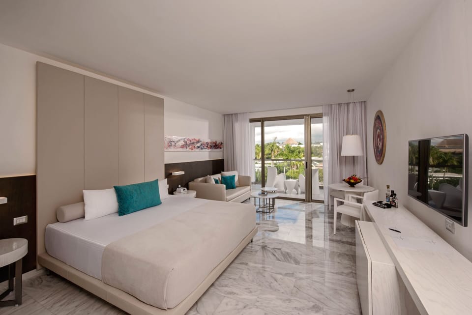 Junior Suite, Pool Access ((Swimout) Deluxe) | Minibar (free items), in-room safe, desk, blackout drapes