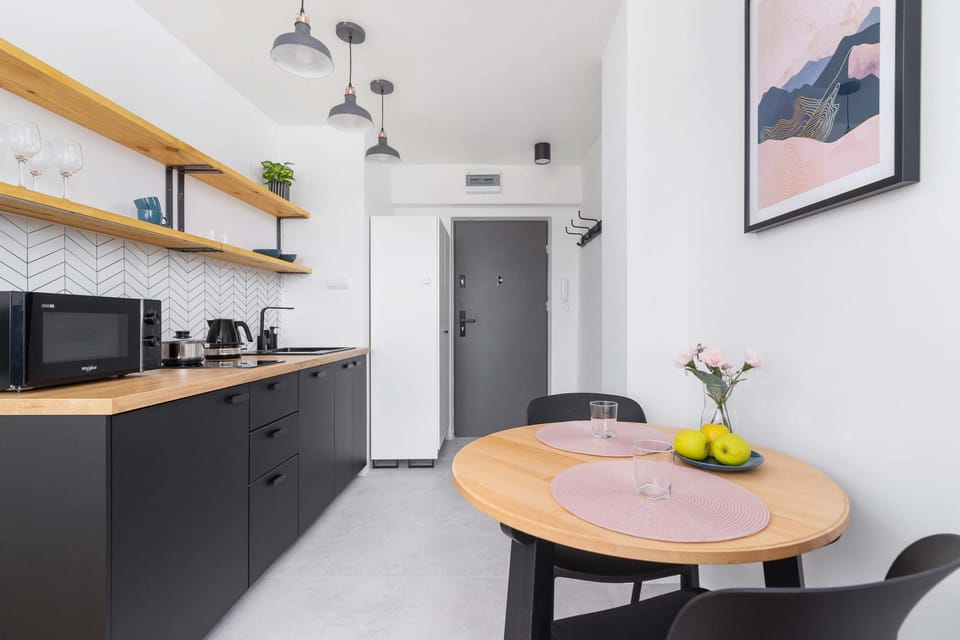 The kitchenette's modern appliances make meal preparation easy.