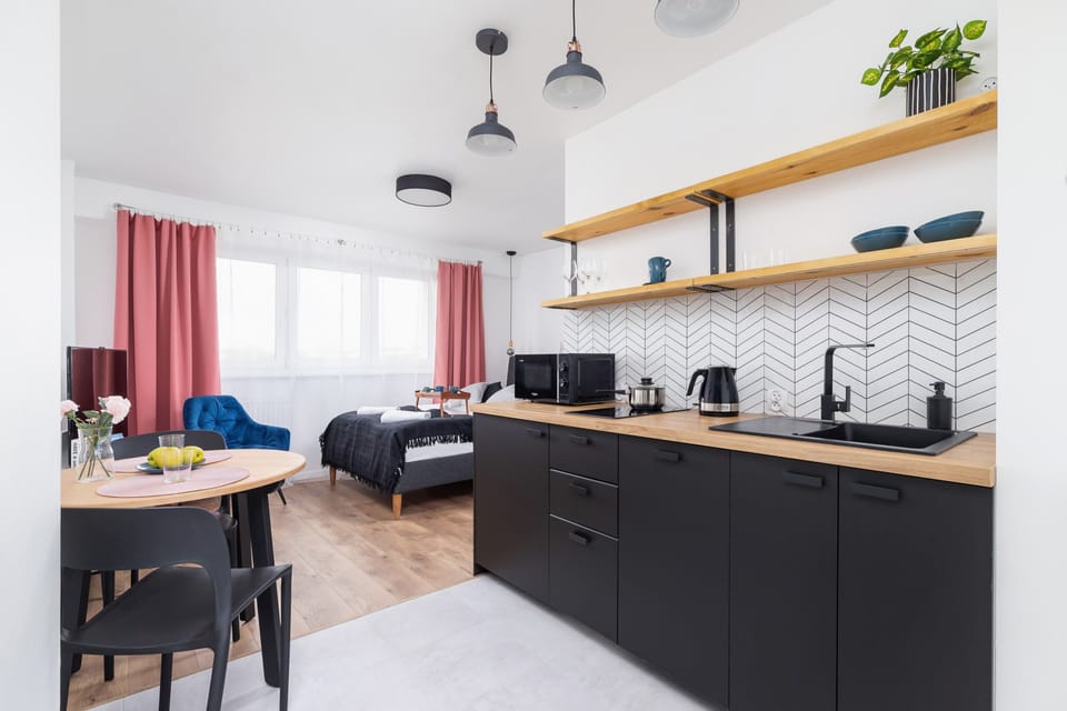 The kitchenette's practical layout maximizes space and functionality.