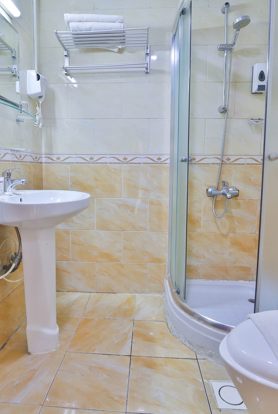 Shower, free toiletries, slippers, towels