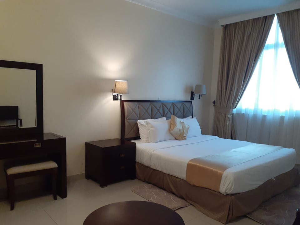 Suite, 1 Bedroom | In-room safe, soundproofing, iron/ironing board, free WiFi