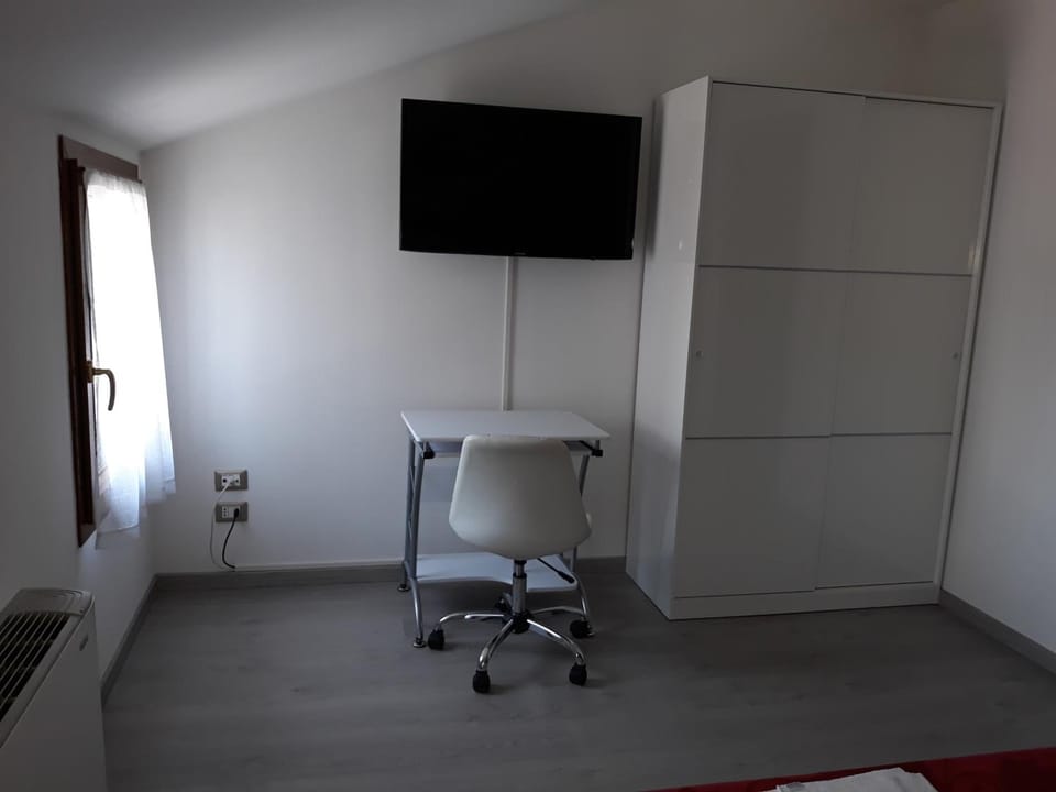 Down comforters, desk, laptop workspace, iron/ironing board (on request)