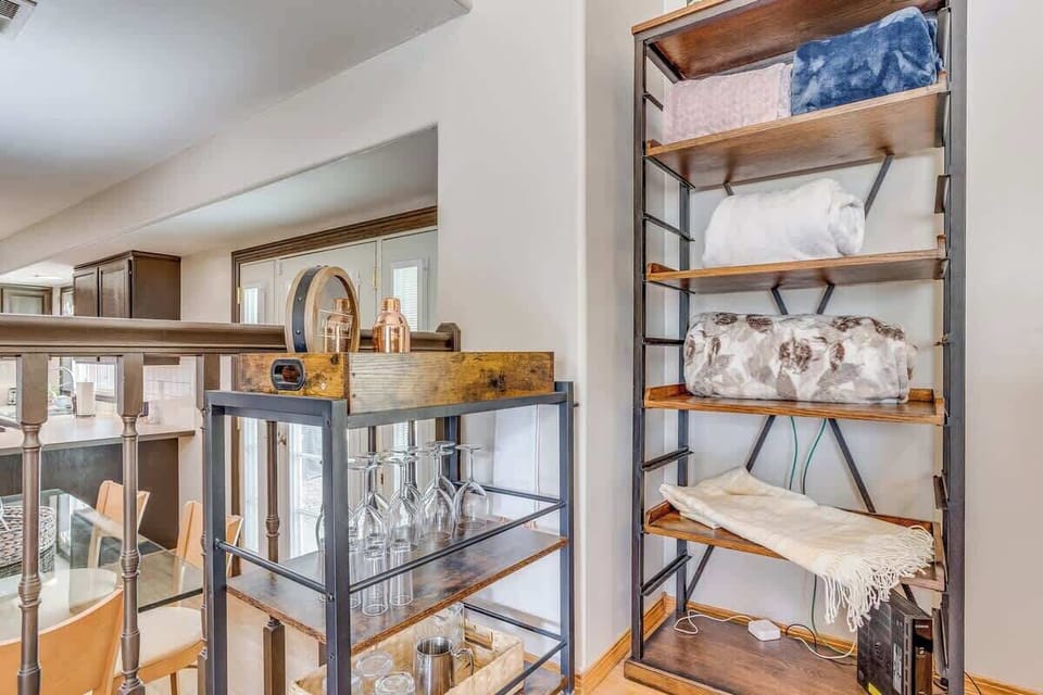 A bar cart is available so you can sip on your drinks or even make your own cocktails while you cozy up on the couch or by the bonfire!