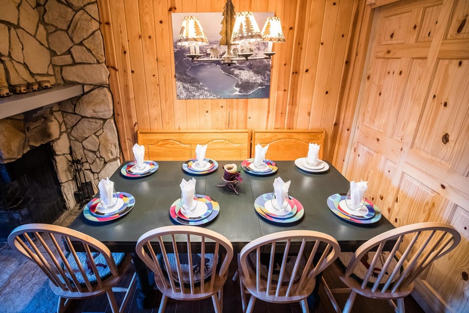 Dining Area - Wall bench + 4 chairs (ski / gear closet behind table)