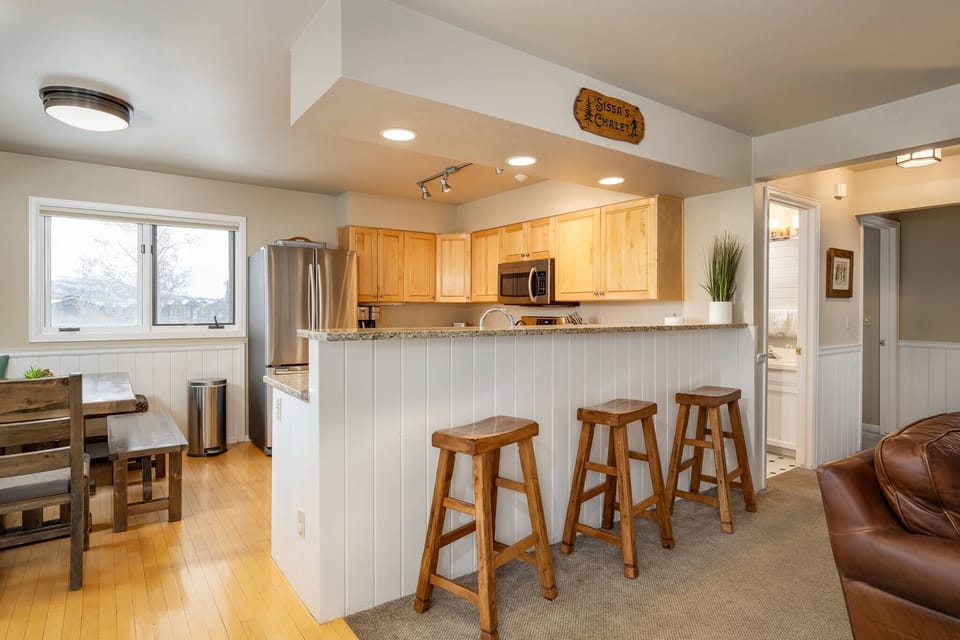 Seating for three at the breakfast bar