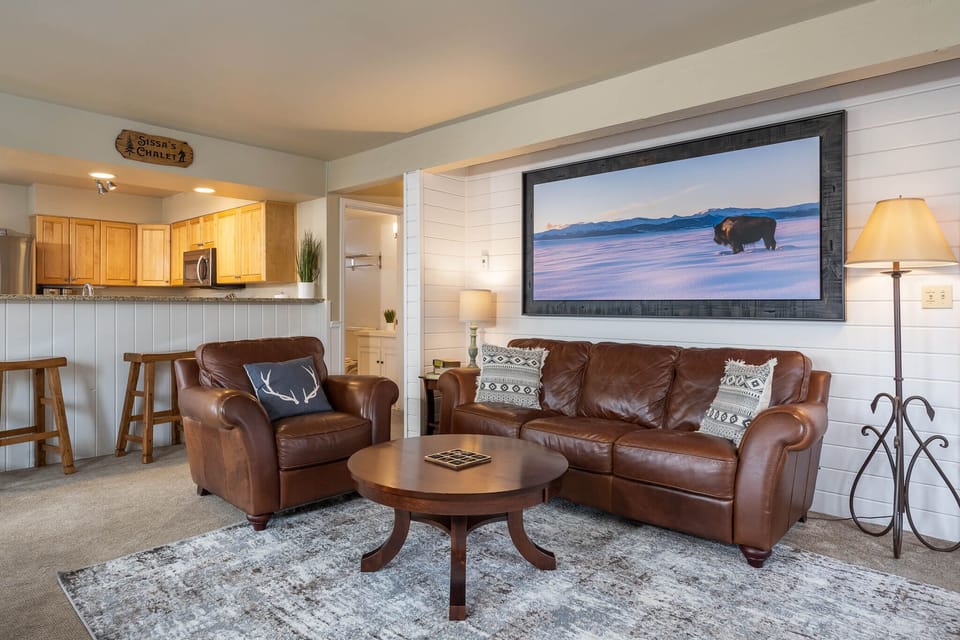 Cozy leather couches and plentiful western inspired art