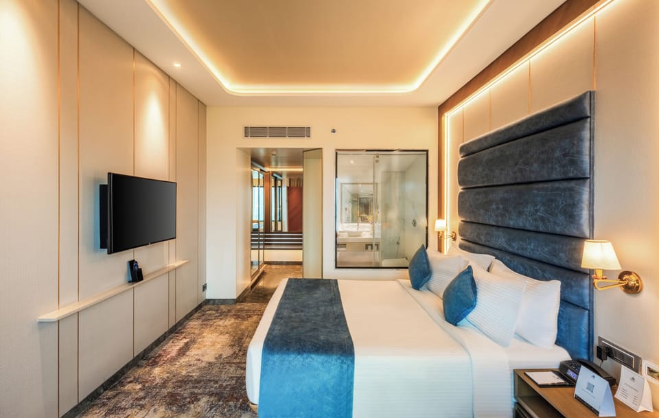 Premium bedding, pillowtop beds, minibar, in-room safe