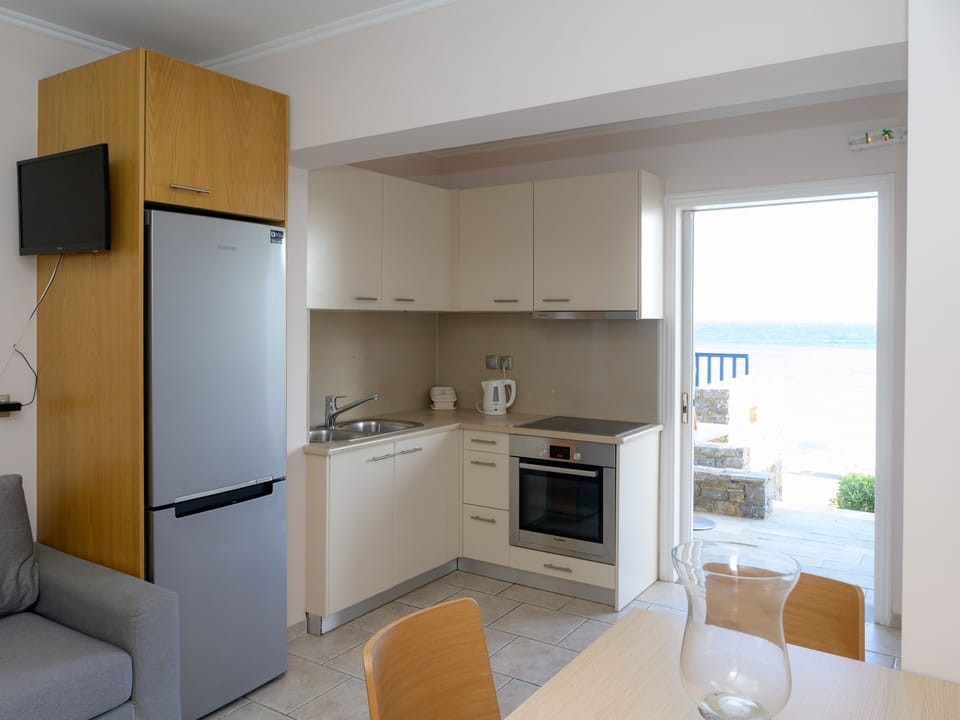 Family Apartment, 1 Bedroom, Beach View | Private kitchen | Fridge, microwave, stovetop, coffee/tea maker
