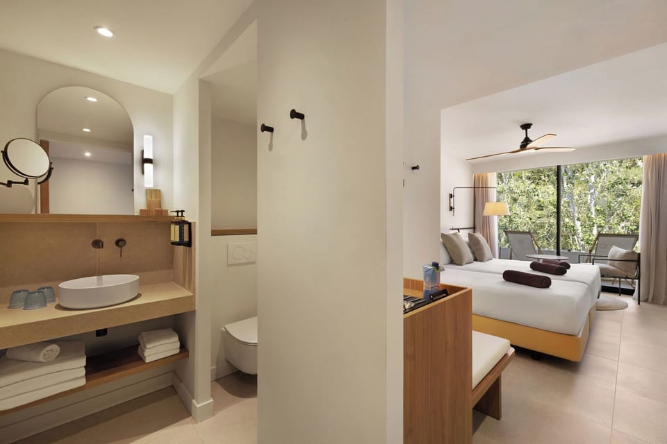 Premium Triple Room, Balcony | Minibar, in-room safe, blackout drapes, soundproofing