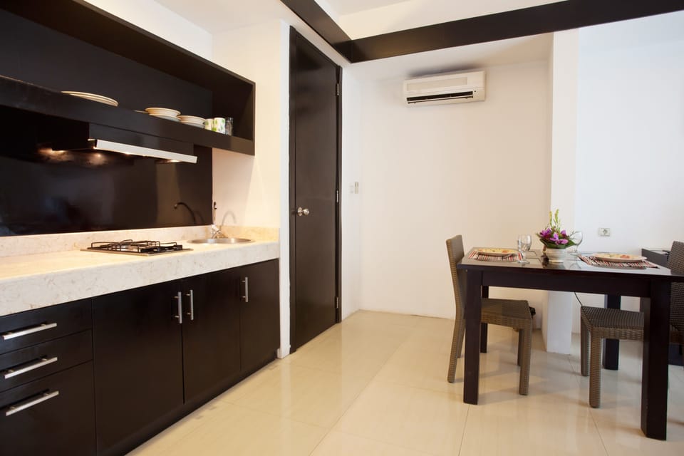 Apartment, 1 Bedroom | Private kitchen | Fridge, stovetop, coffee/tea maker, electric kettle
