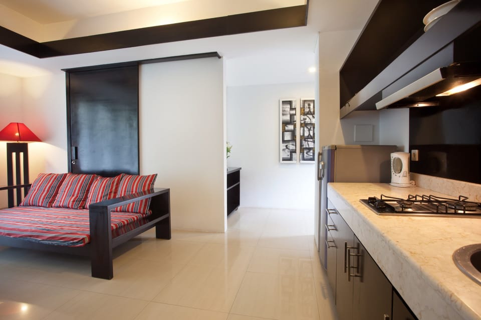 Apartment, 1 Bedroom | Private kitchen | Fridge, stovetop, coffee/tea maker, electric kettle