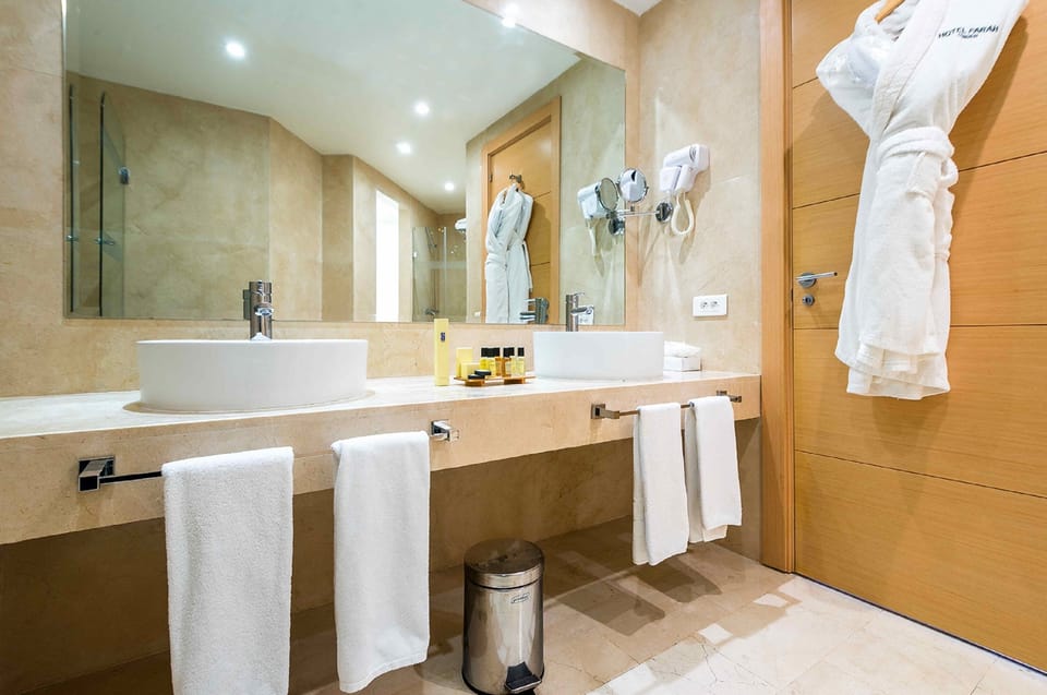 Free toiletries, hair dryer, bathrobes, slippers