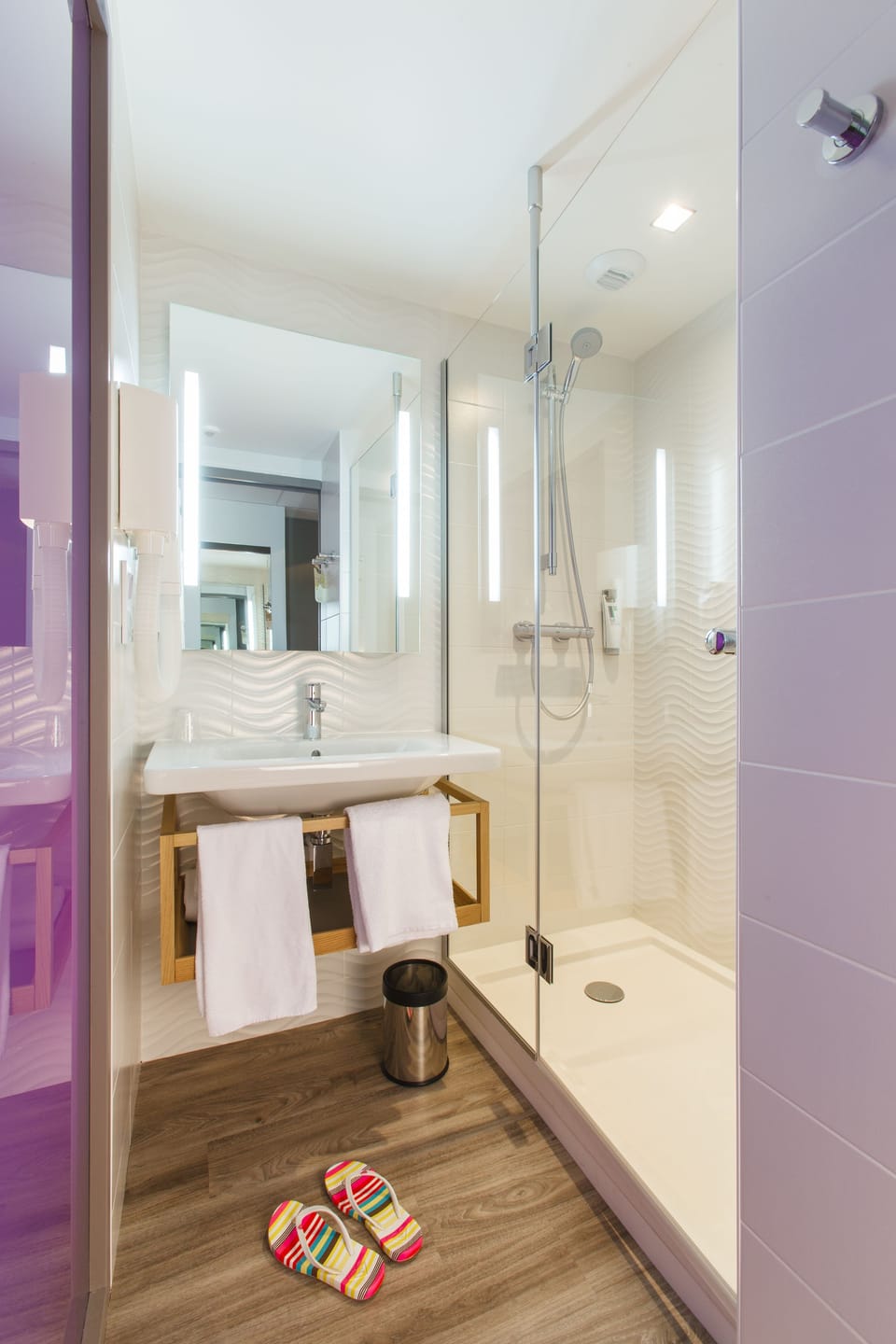 Shower, eco-friendly toiletries, hair dryer, towels