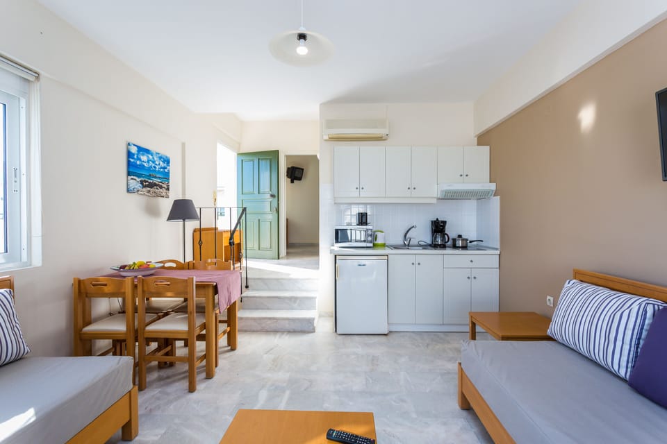 Family Apartment, 1 Bedroom, Sea View | Private kitchenette | Fridge, microwave, stovetop, coffee/tea maker