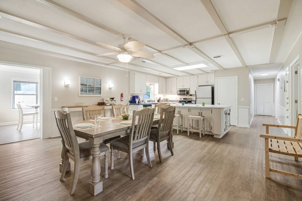 Large dining area leading to kitchen and bar