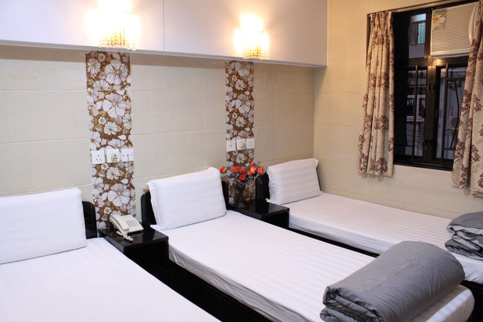 Triple Bed Room (Double &Single Bed) | In-room safe, free WiFi, bed sheets, wheelchair access