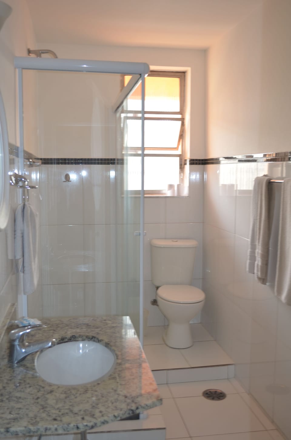 Shower, rainfall showerhead, towels