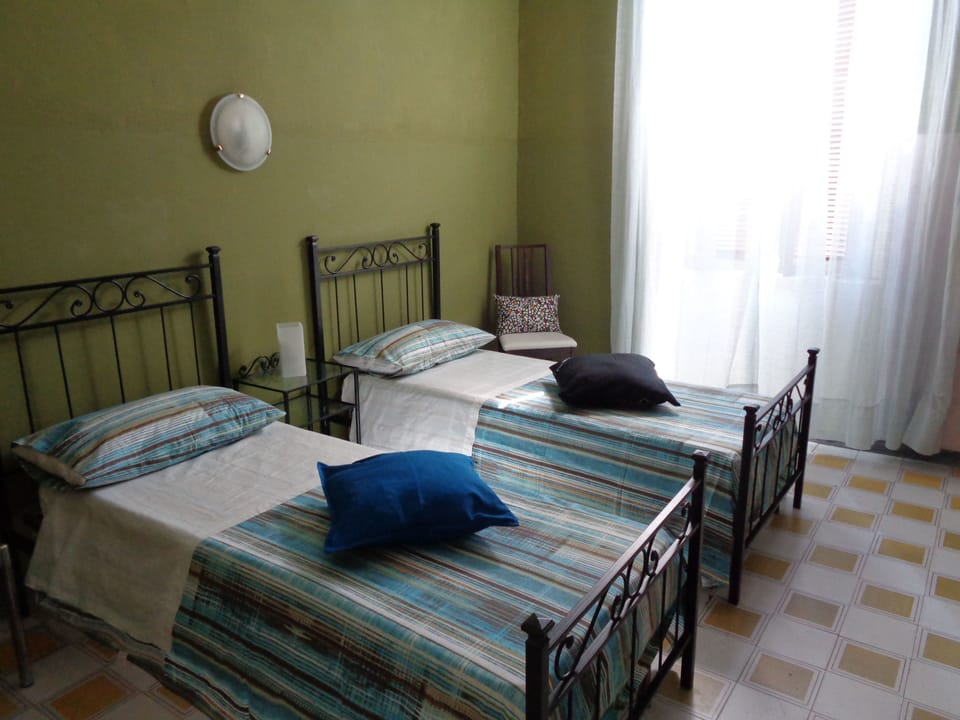 Twin Room, Women only, Shared Bathroom | Free WiFi, bed sheets