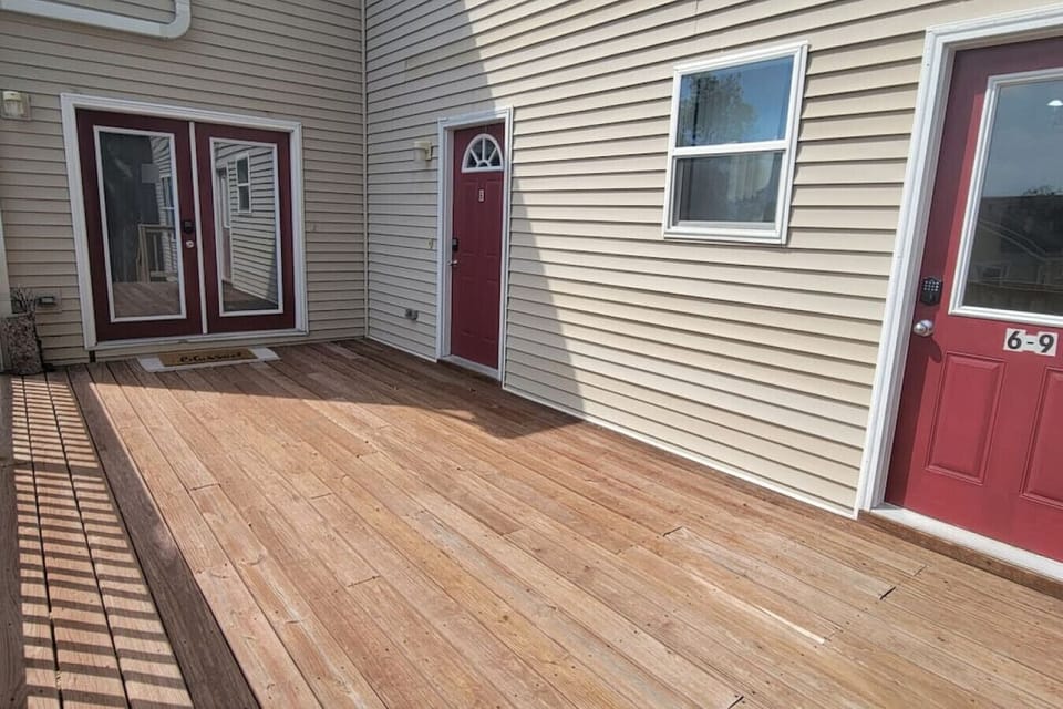 Welcome to your home away from home! Step through our inviting front door and immerse yourself in the charm and tranquility of our short-term rental`s patio area. Experience a seamless blend of indoor and outdoor living as you relax in this serene oasis. 