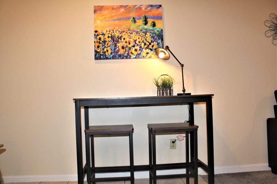 Experience the charm of intimate dining in our small dining area nestled within our studio apartment. Thoughtfully designed to maximize space without compromising on comfort, this cozy dining space offers a perfect setting to enjoy meals or engage in live