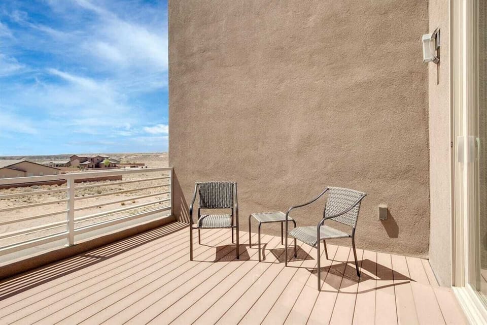 Upstairs deck with views of the mountains