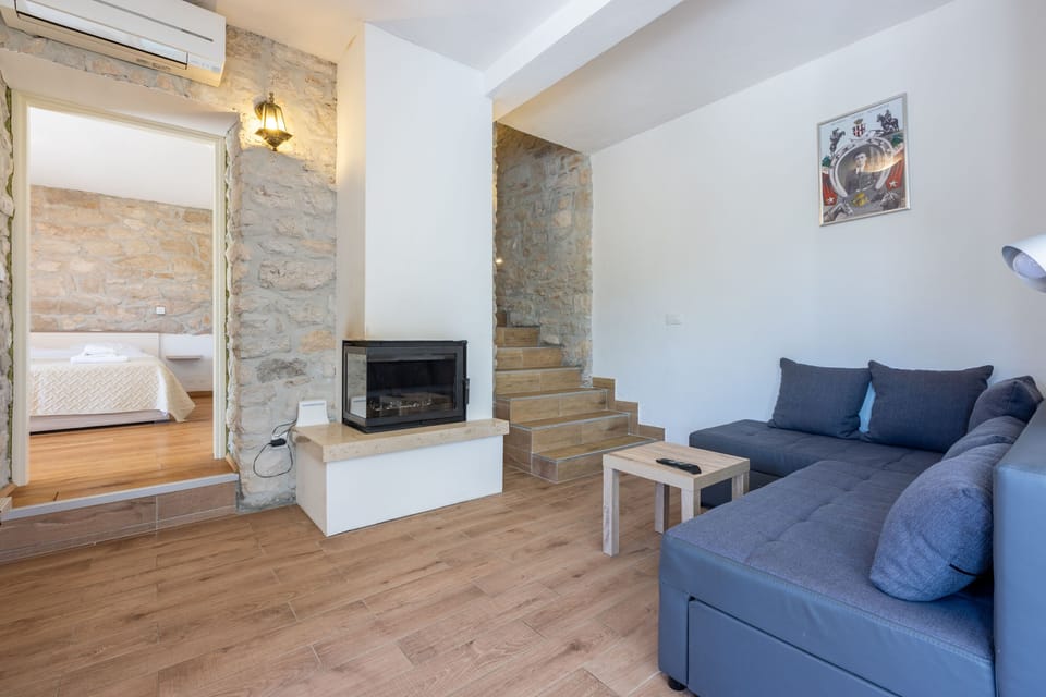 Villa | Living room | Fireplace