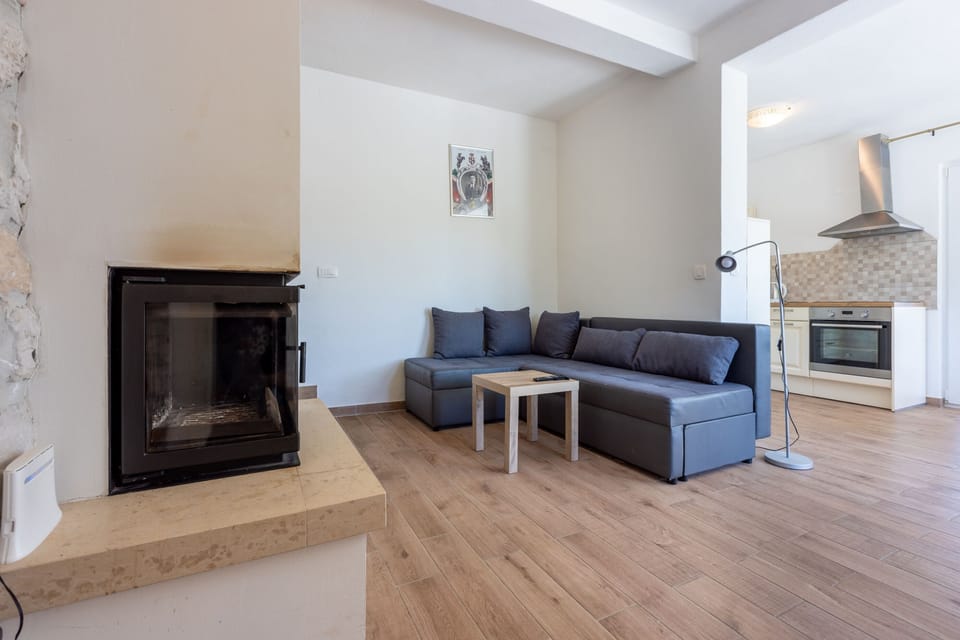 Villa | Living room | Fireplace