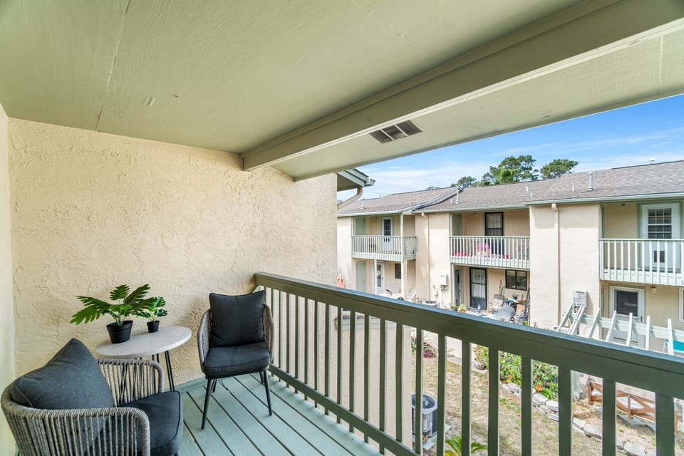 Enjoy your morning coffee on the private balcony off the primary bedroom.