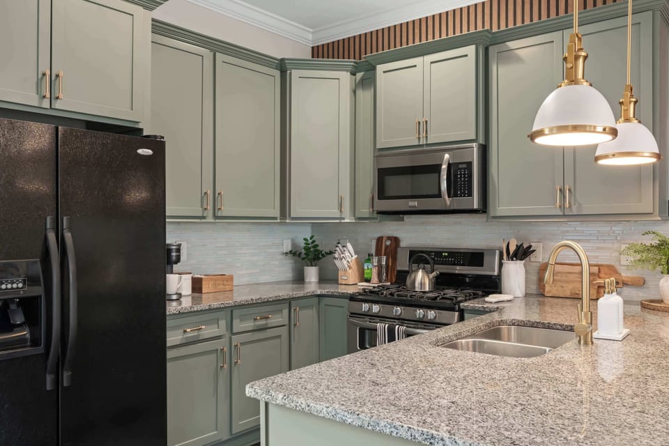 Enjoy casual dining at the well-lit kitchen counter with additional seating