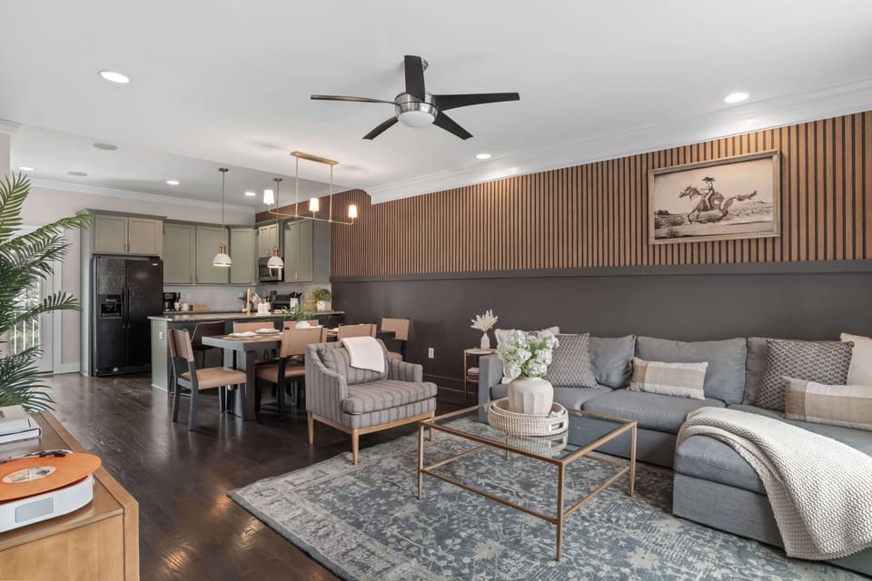 Bright, well-lit living room with a warm, homey feel—perfect for relaxing together