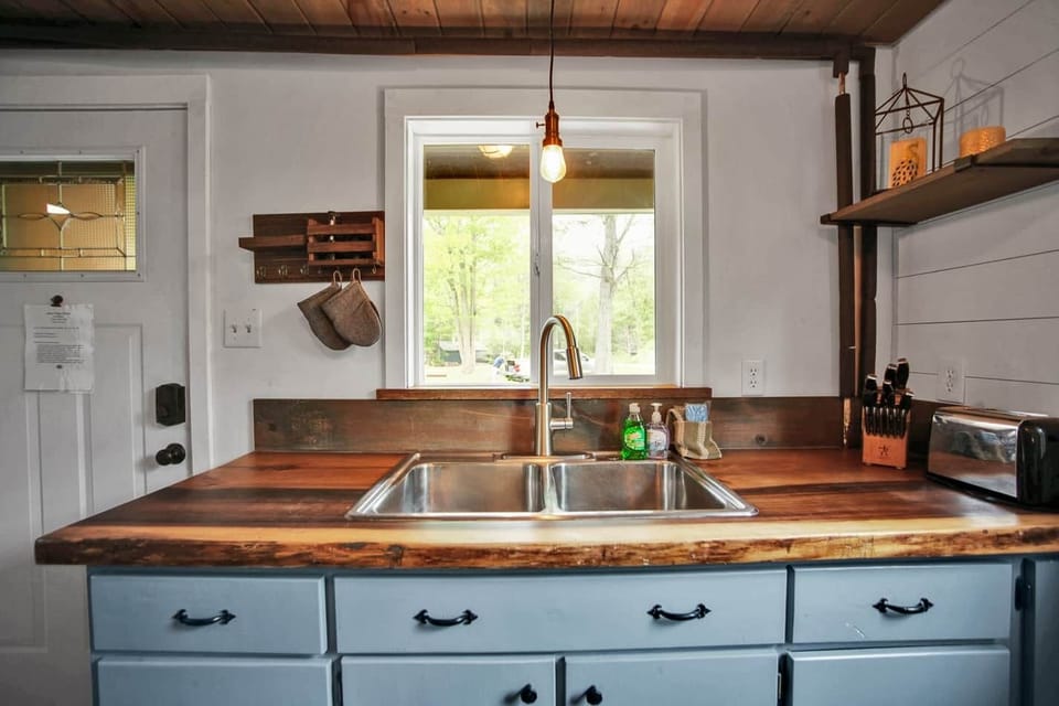 Kitchen with Keurig and coffee pot, outdoor bbq, crockpot. 