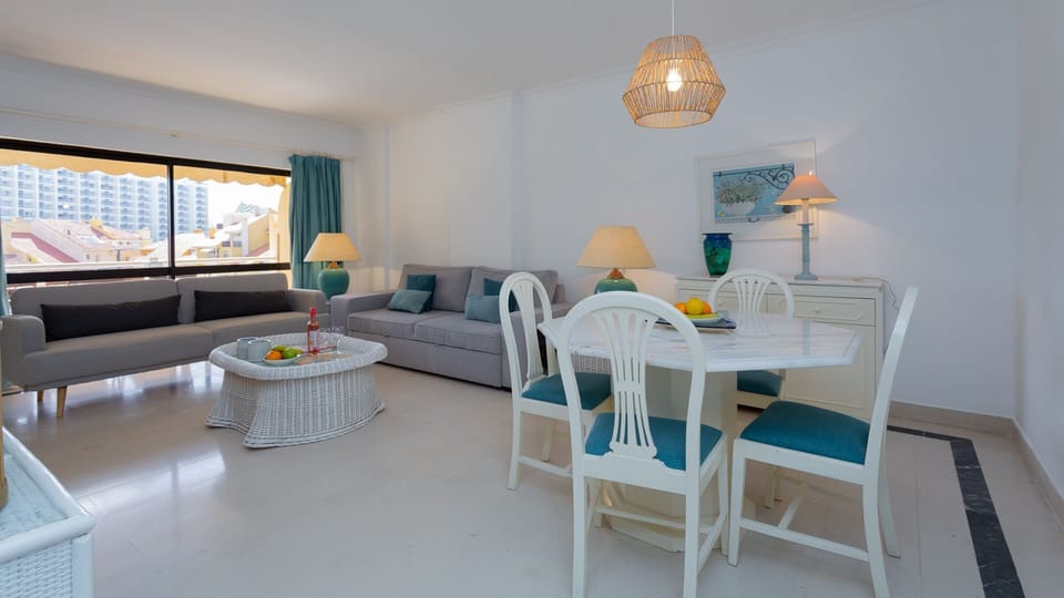 A spacious living room with a bright and dazzling decor for a great time of comfiness #spacious #comfy #dazzling #algarve #airbnb