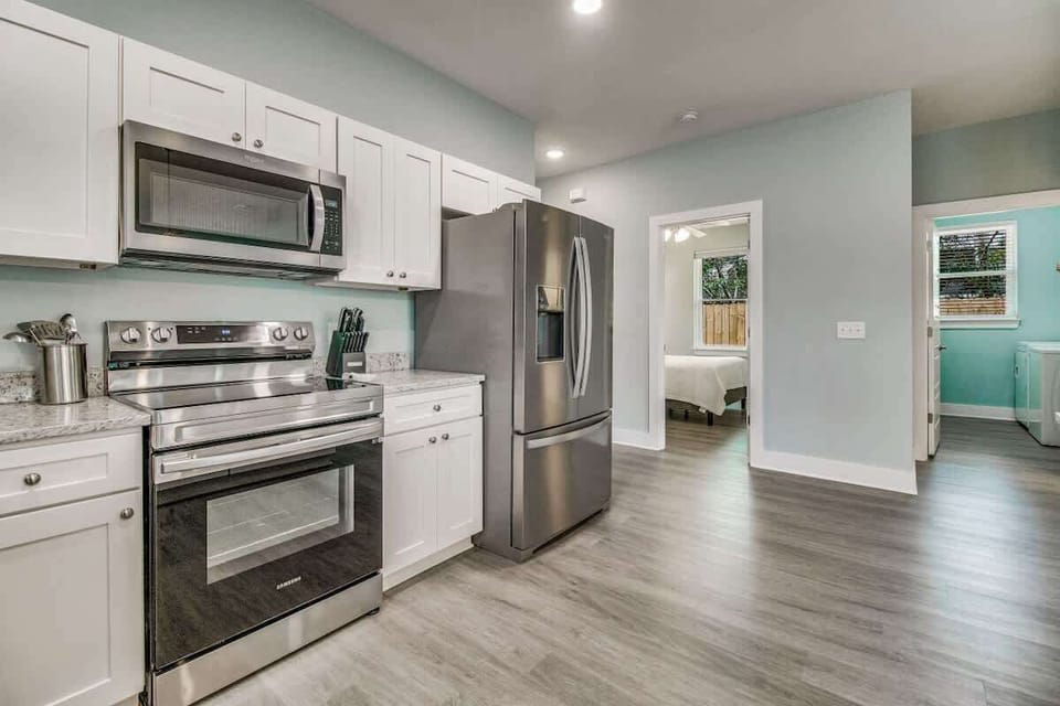 Fully stocked kitchen with stainless appliances