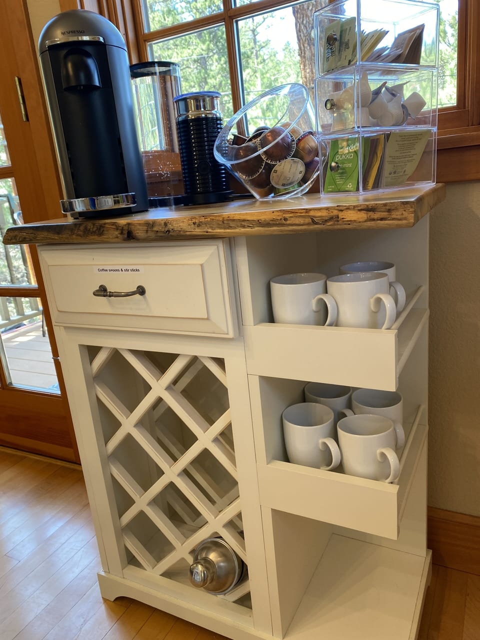 Coffee bar with wine storage.