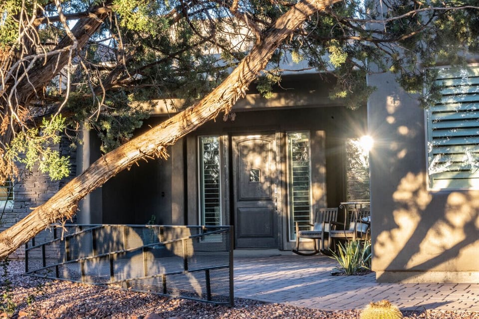 Front Entry Lit at night but secluded and nestled in the pines.