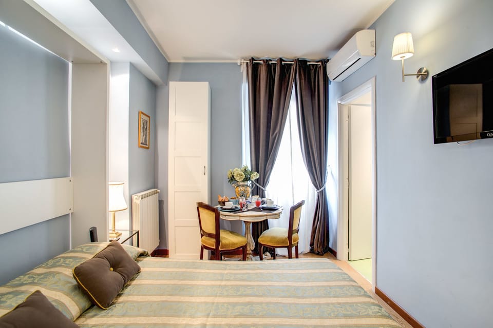 Classic Double Room | In-room safe, individually decorated, desk, iron/ironing board