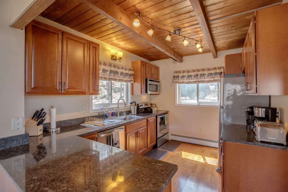 Kitchen with stove, oven, microwave, dishwasher, refrigerator