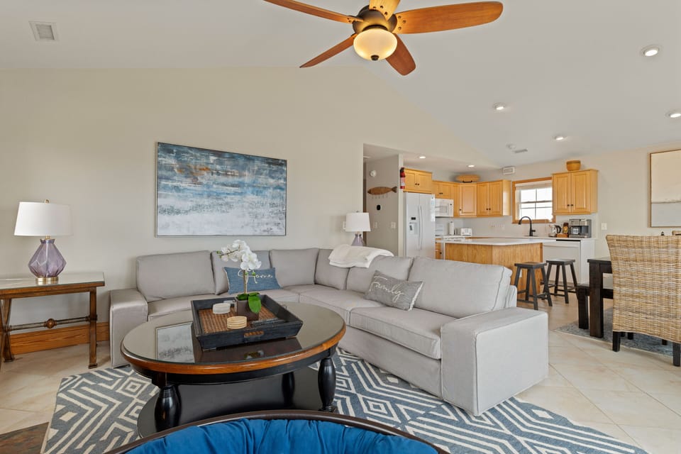 Living room to lounge in while food is being prepared in the kitchen. 