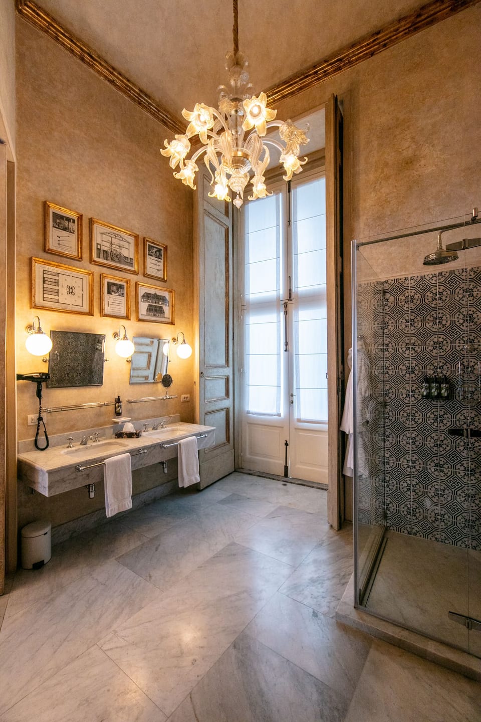 Shower, rainfall showerhead, designer toiletries, hair dryer