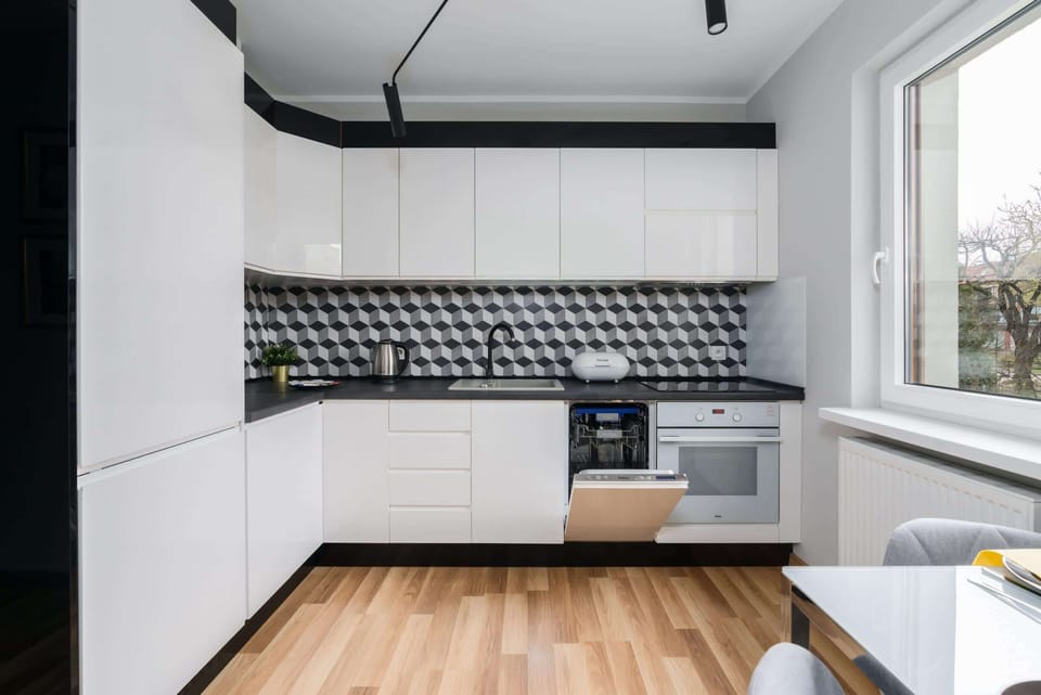 The fully equipped kitchenette includes everything you need for a home-cooked meal.