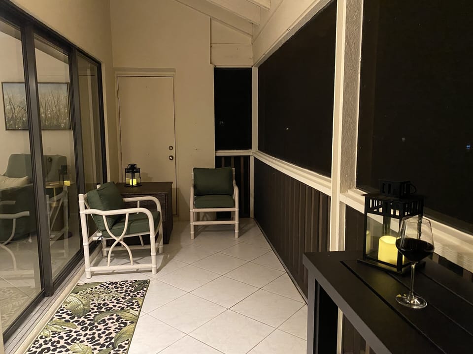 Enjoy the evening outdoors on your private screened porch 