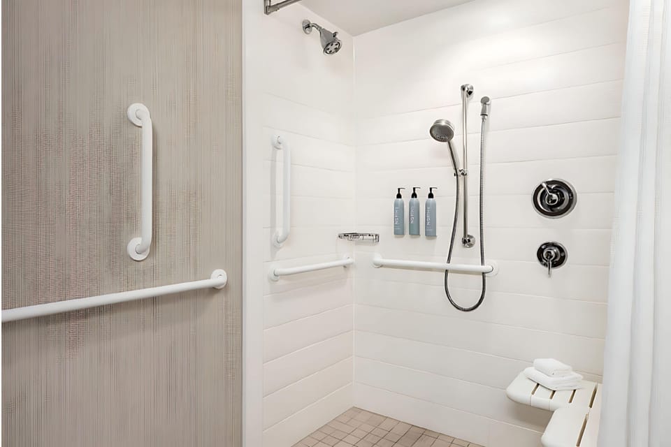 Hair dryer, towels, soap, shampoo