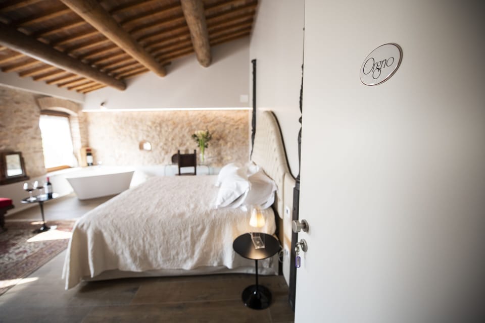 Premier Suite con Vasca | Desk, blackout drapes, free WiFi, bed sheets
